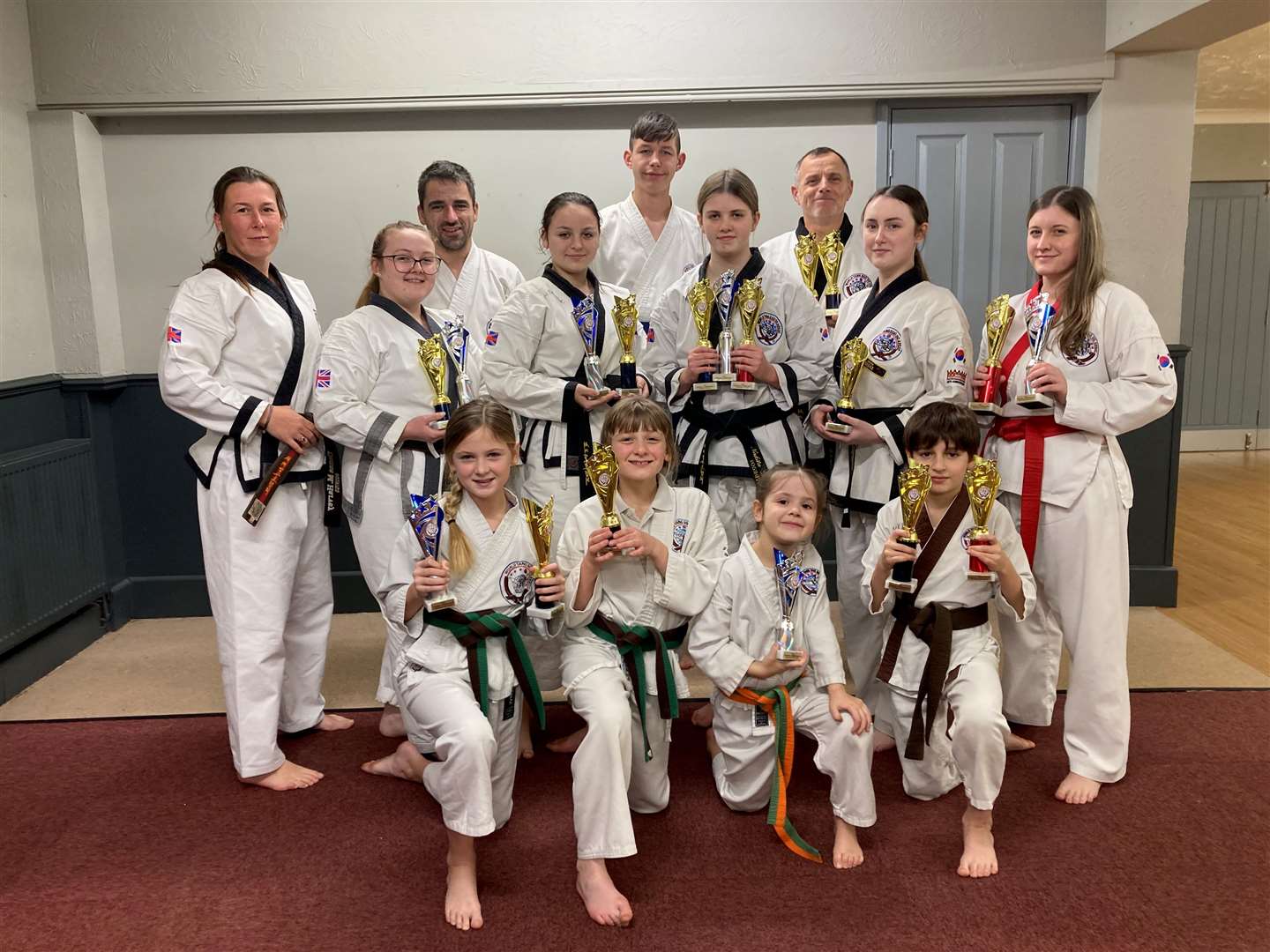 Wisbech & Kings Lynn Tang Soo Do martial arts club members who competed in Middlesborough. Front, from left: Tia Cowdrey 2nd in forms & 3rd in sparring, Sophia Mancini-Bright 3rd in forms, Zoe Freeman, Aleks Targanski 1st in forms & 2nd in weapons; middle: Instructor Donna Harvey, Sophia Stanton 3rd in forms & 1st in sparring, Emilia Targanska 2nd in forms & 2nd in sparring, Nakita Davies 1st in weapons, 1st in forms & 1st in sparring, Tracey-Kym Gooch 2nd in weapons, 3rd in forms & 3rd in sparring, Katie Day 1st in weapons & 2nd in sparring; back: Sebastian Targanski, Domas Fominas, Dean Frost 3rd in weapons & 3rd in forms.