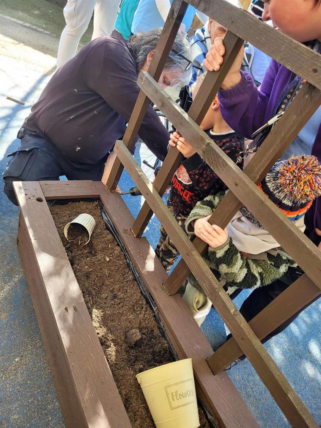 The children of Little Owls Nursery helped residents at the Orchards Care Home in Wisbech create a sensory garden.