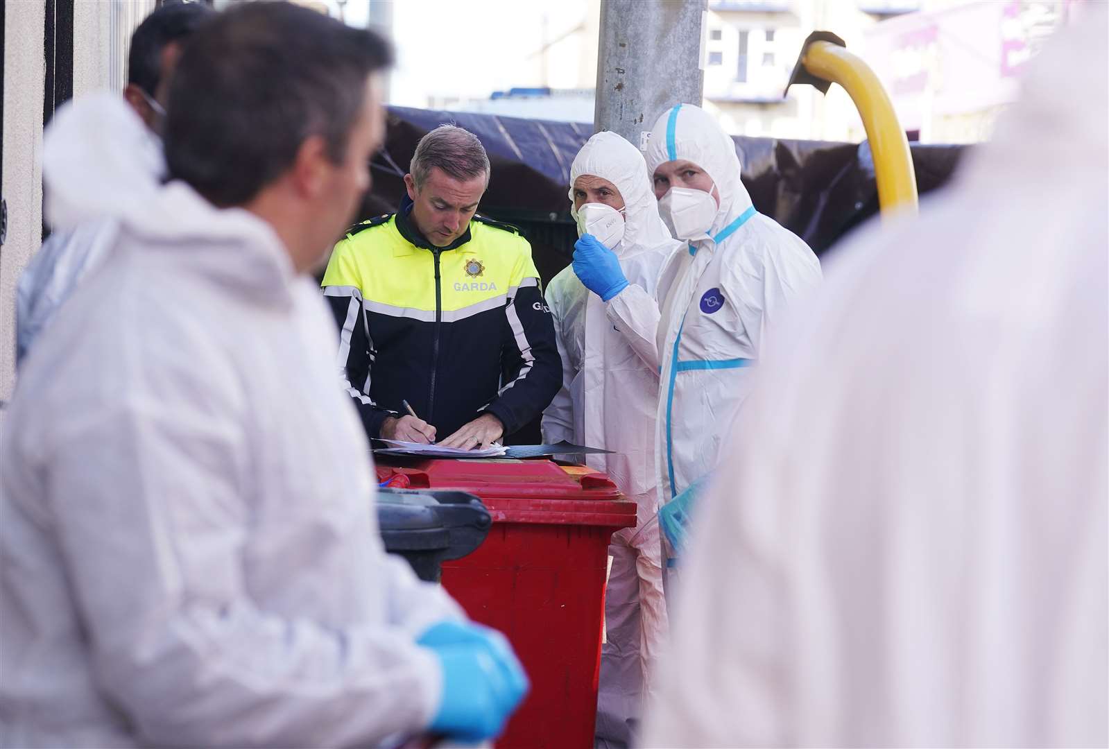 Members of the Garda forensics at the scene in Youghal, Co Cork (Brian Lawless/PA)