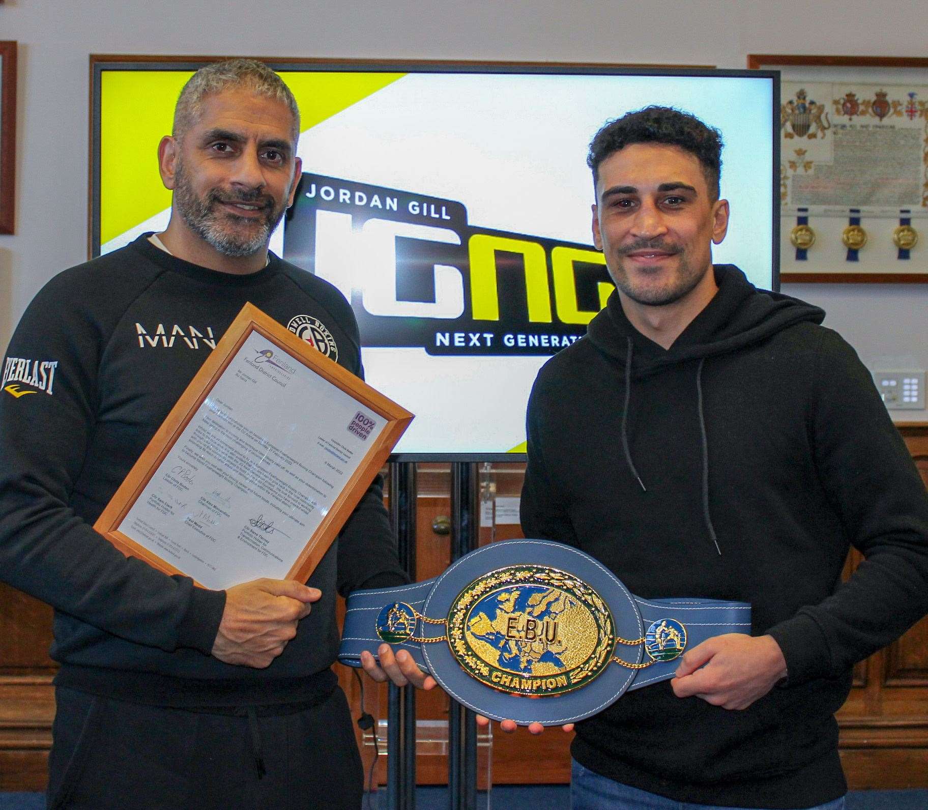 Boxer Jordan Gill with his dad Paul and his Featherweight Championship belt. (56538290)