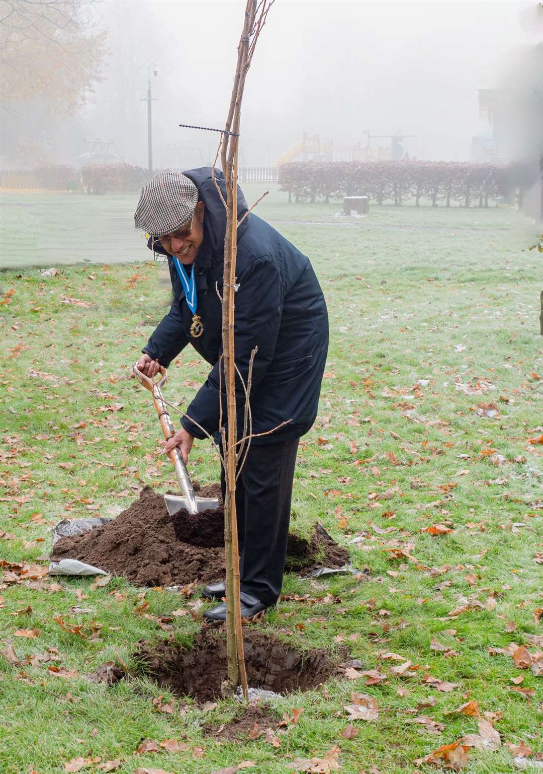 Bharat Khetani, High Sheriff of Cambridgeshire plants the tree using the spade given by Princess Diana. Photo: Roger Rawson.