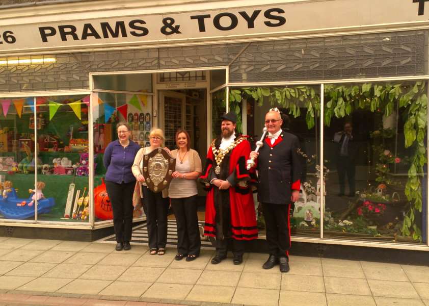The winner of the Rose Fair Window Competition 2016. Prams & Toys in Hill Street, Wisbech ANL-160629-134227001
