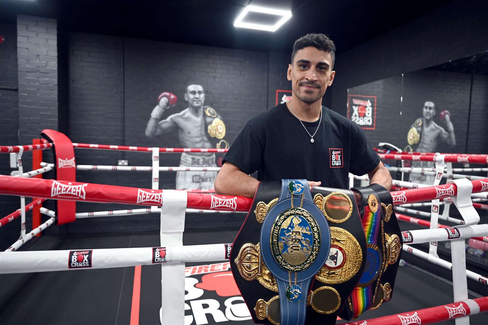 Jordan Gill with his array of belts. Picture: Adam Fairbrother
