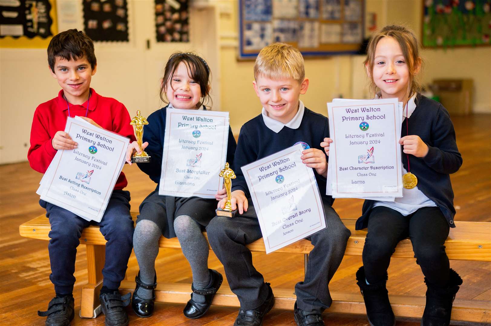 Class One winners with their certificates and trophies.