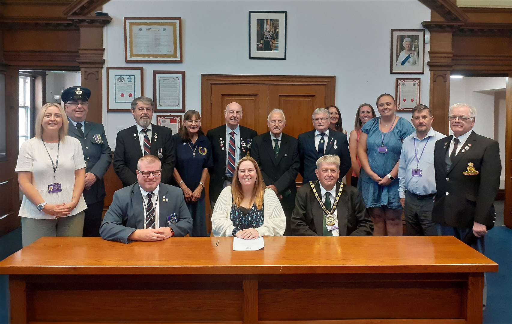 Cllr Susan Wallwork, centre, signs the covenant with representatives of the council and Armed Forces Community.