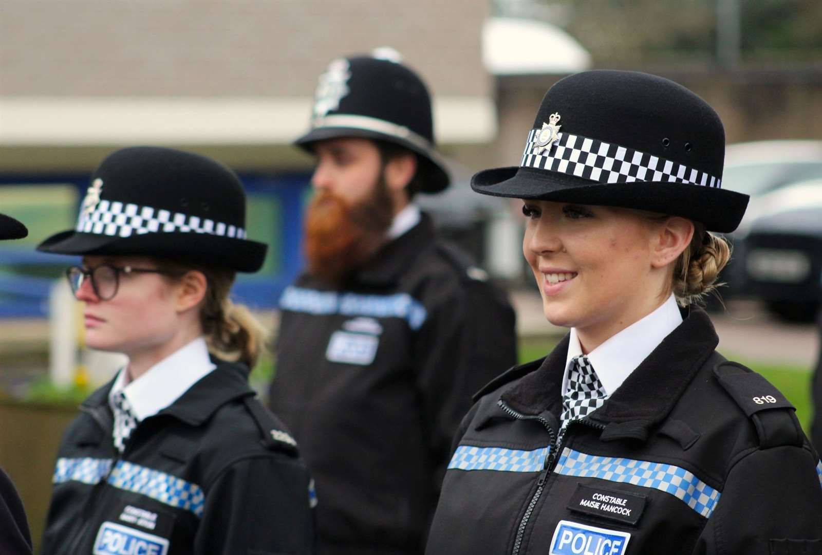 Fourteen new police officers celebrated the start of the new year today by passing out in front of family and friends.