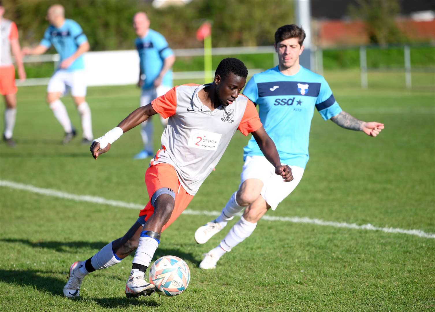 Parson Drove (grey and orange) v Holland (blue). Byron Adiado