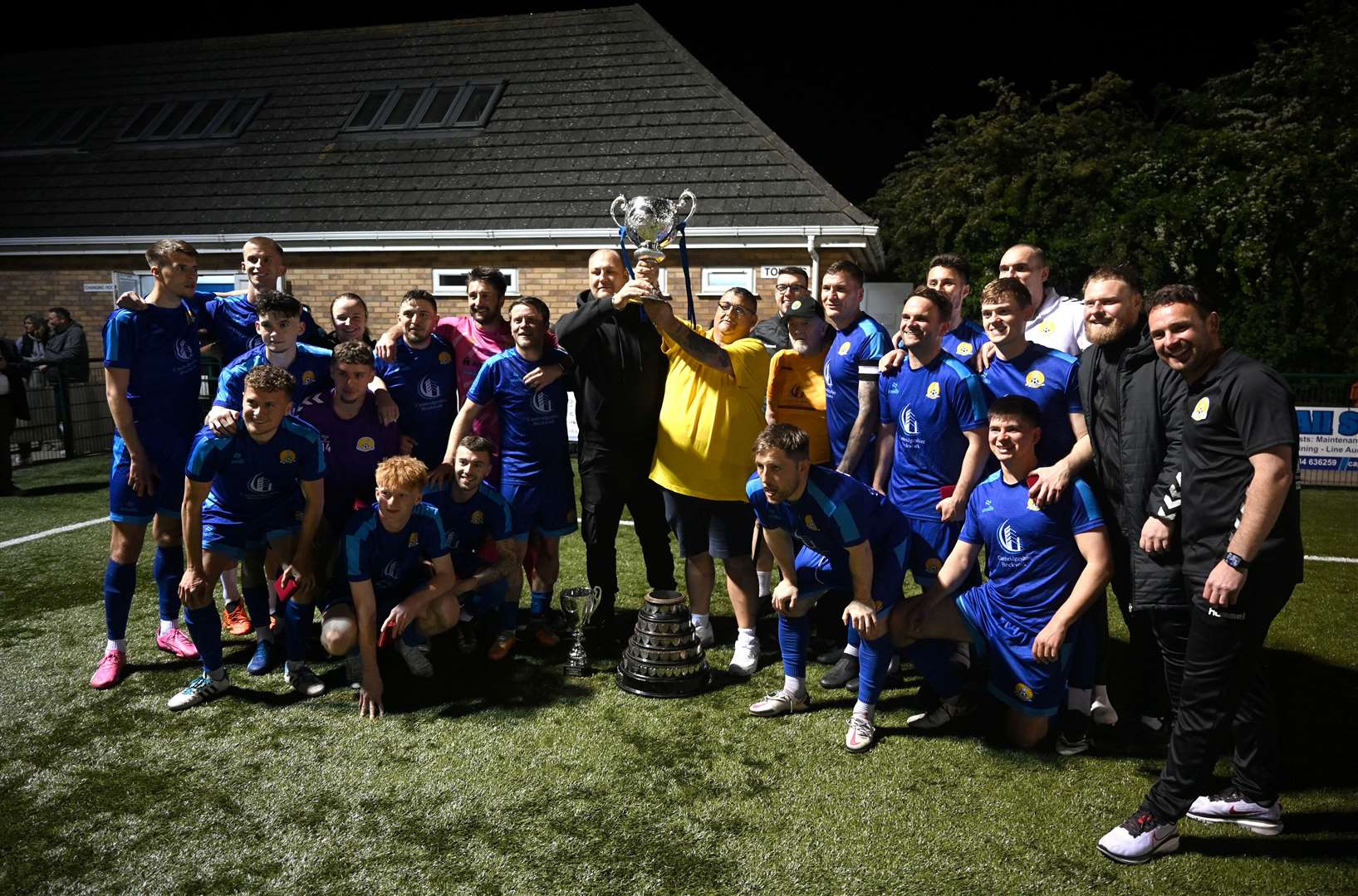 March (Blue) v Blackstones (Green and Black) in the final of the Hinchingbrooke Cup. March celebrate winning the cup