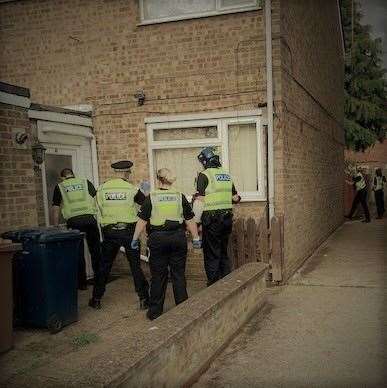 Police executing a drugs warrant. (36664347)
